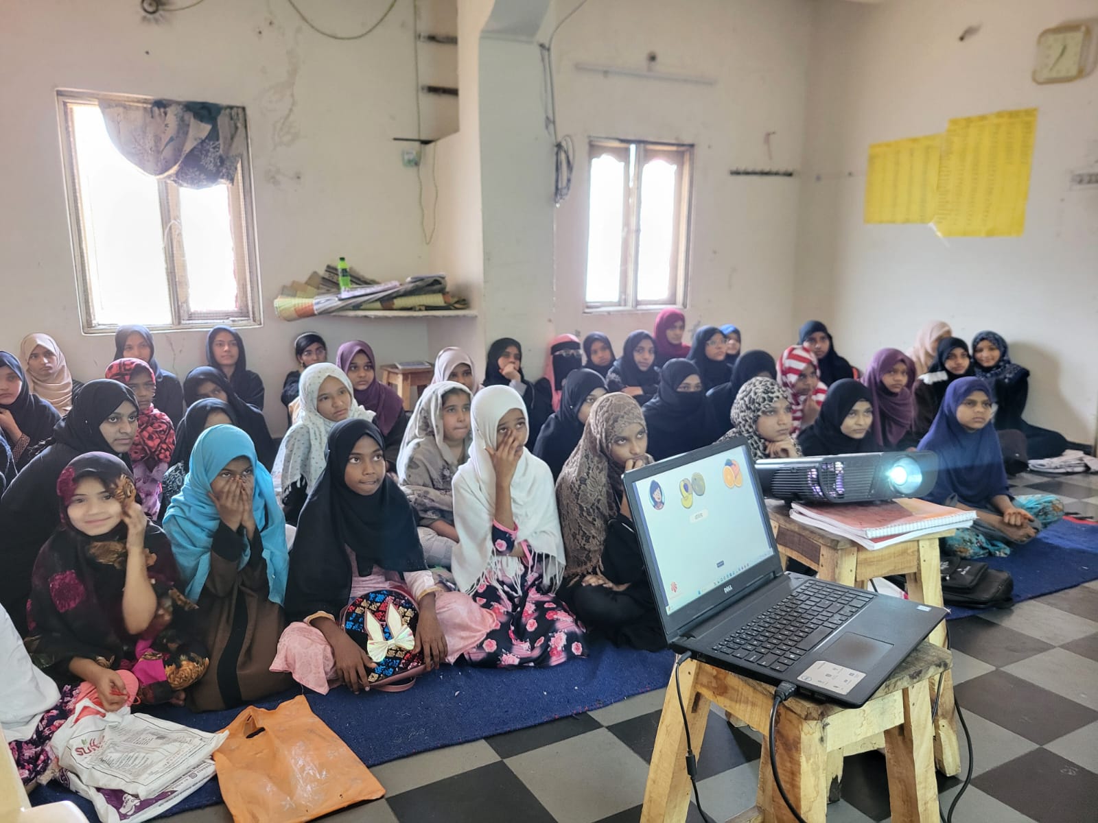 group of girls listening to a class